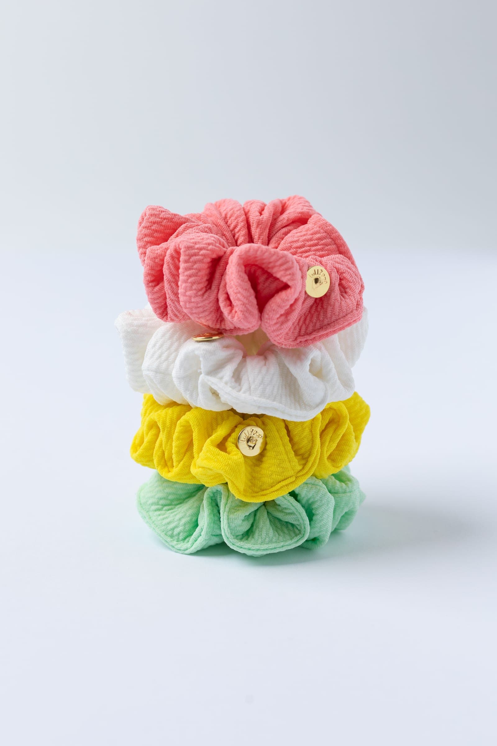Lullipop Scrunchie — Pink. Collection photograph; selected color may differ.